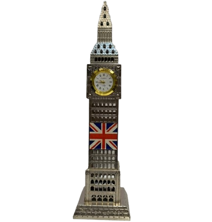 A detailed silver Big Ben clock tower replica with a functional clock face and a Union Jack flag emblem, standing on a white marble surface.