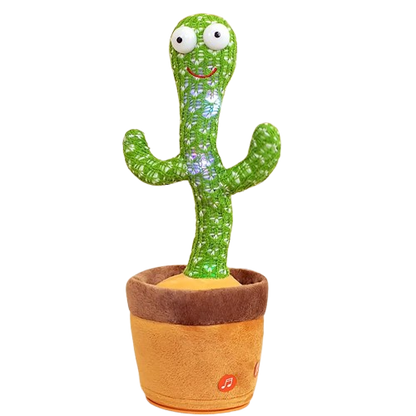 Electronic dancing and singing green knitted cactus toy with big eyes inside a soft brown pot on a white surface.