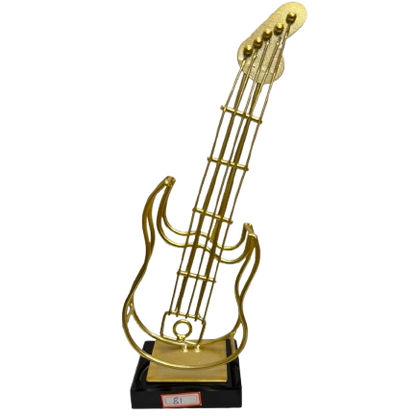 A minimalist gold-toned metal electric guitar showpiece by Gift by Hamza with a sleek black base, perfect for modern home decor.