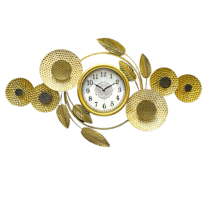 Golden sunflower metal art wall clock featuring textured floral sculptures and a central clock face mounted on a light wall.