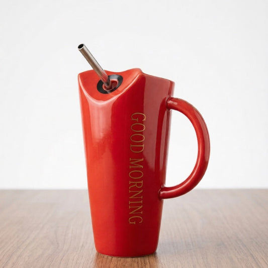 A vibrant red ceramic coffee mug by Gift by Hamza featuring 'GOOD MORNING' gold text and a convenient stainless steel straw.