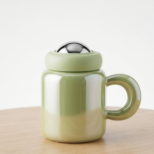 Gift by Hamza Minimalist Green Ceramic Mug with Chrome Dome
Modern light green mug featuring an elegant iridescent finish and a polished chrome dome lid.