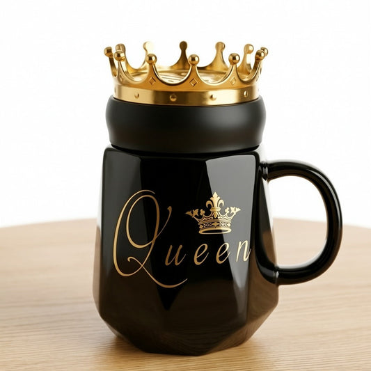 A premium black ceramic mug by Gift by Hamza featuring gold "Queen" calligraphy and a majestic golden crown-shaped lid.