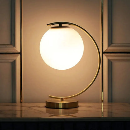 Modern Gold Table Lamp with Frosted Glass Globe